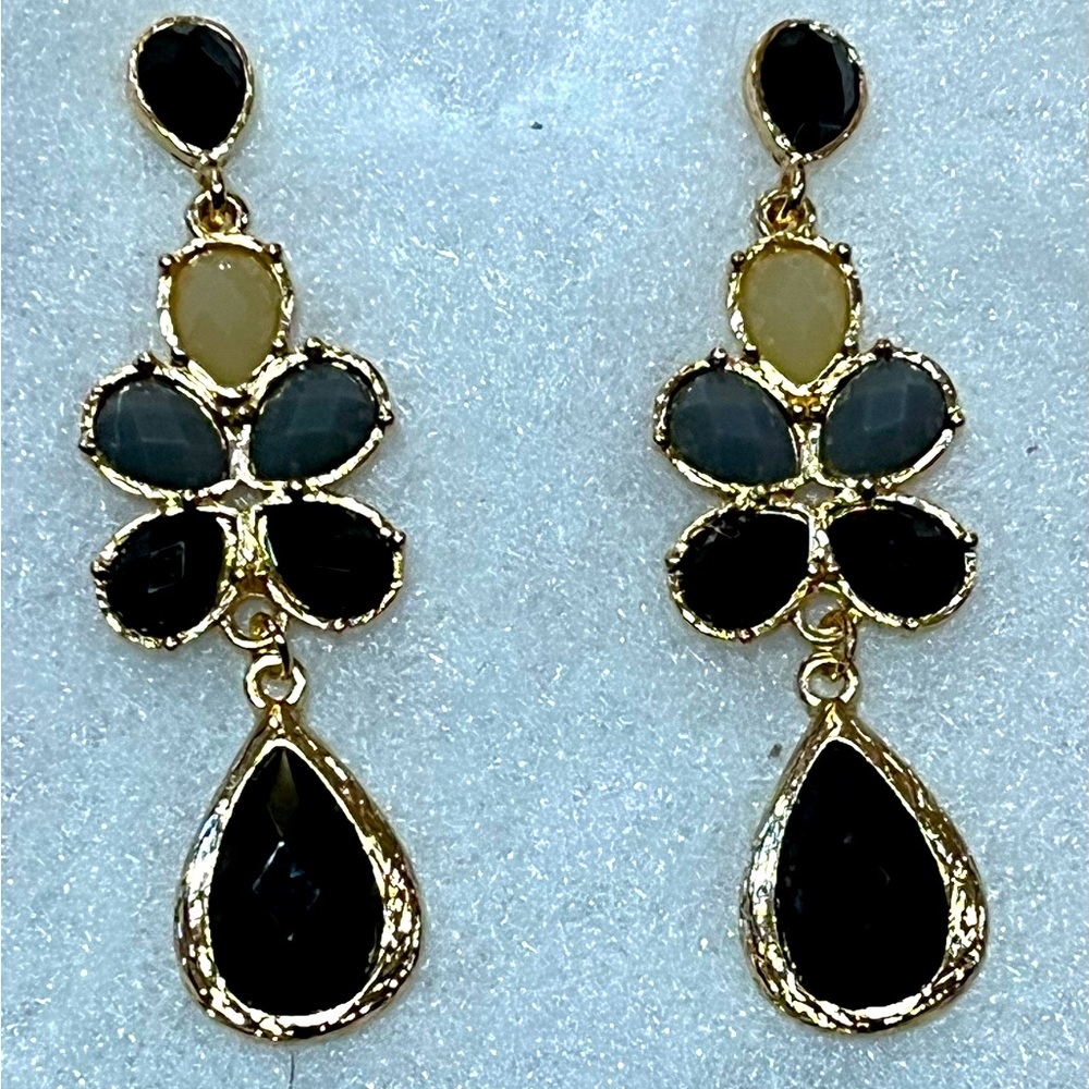 Boho peacock style black and grey earrings.